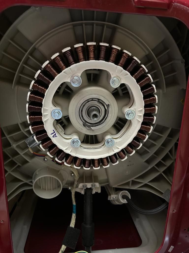 The overloaded washing machine is causing damage to both the engine and the control board.